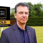 NICK B HEADSHOT with board L1024547